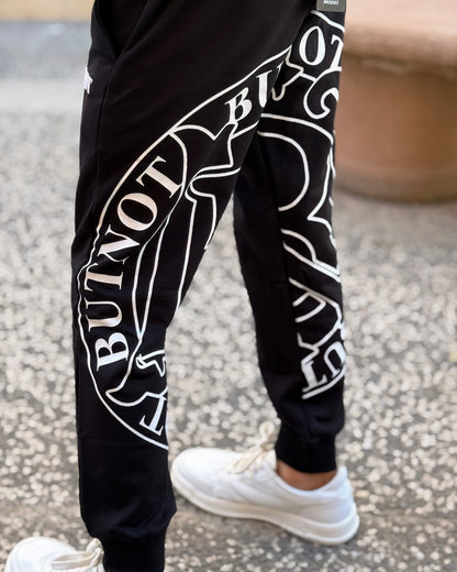 BUT NOT - Pantalone nero con logo sul retro