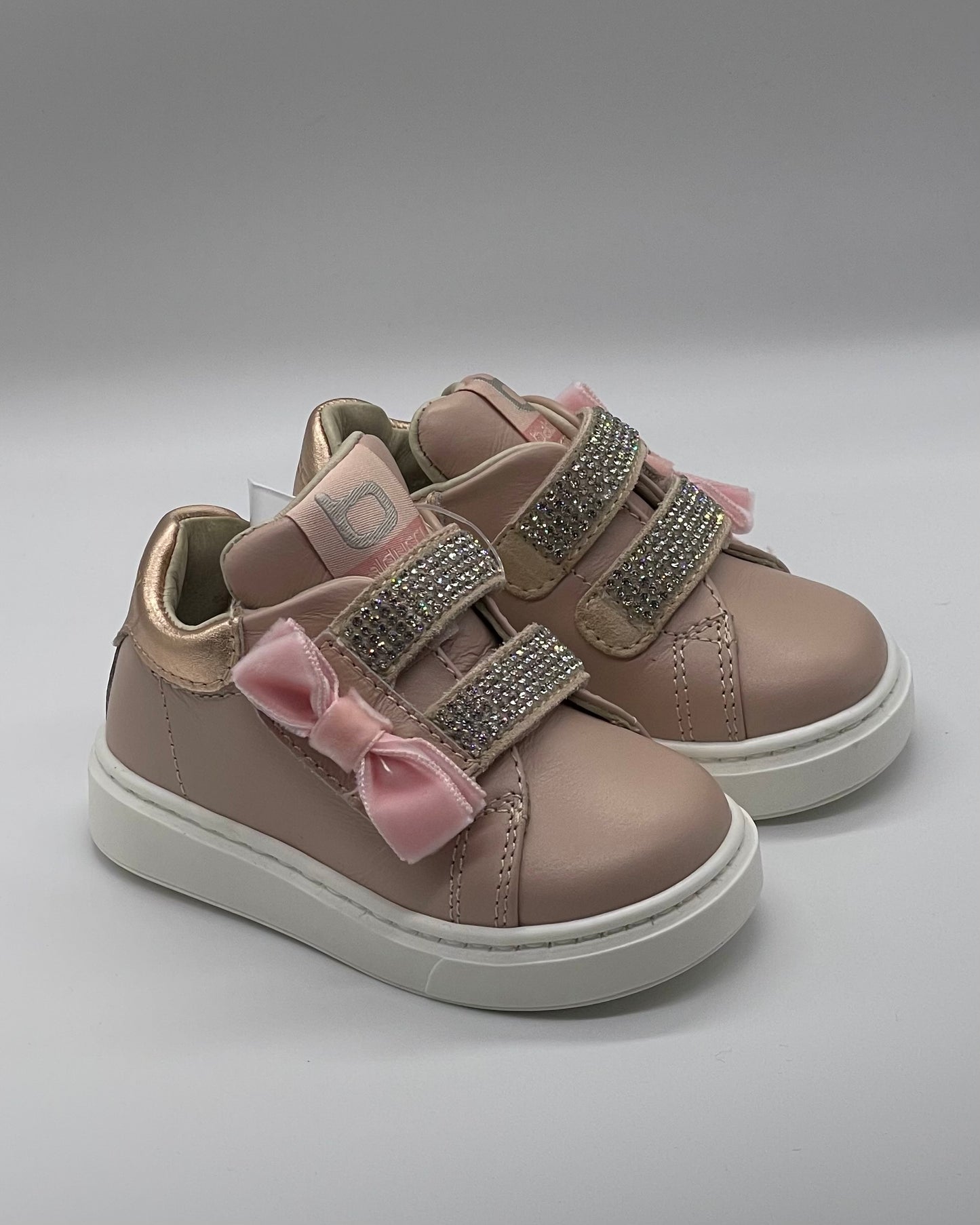 BALDUCCI - PRIMO PASSO - Sneakers rosa con fiocchetto laterale e strass