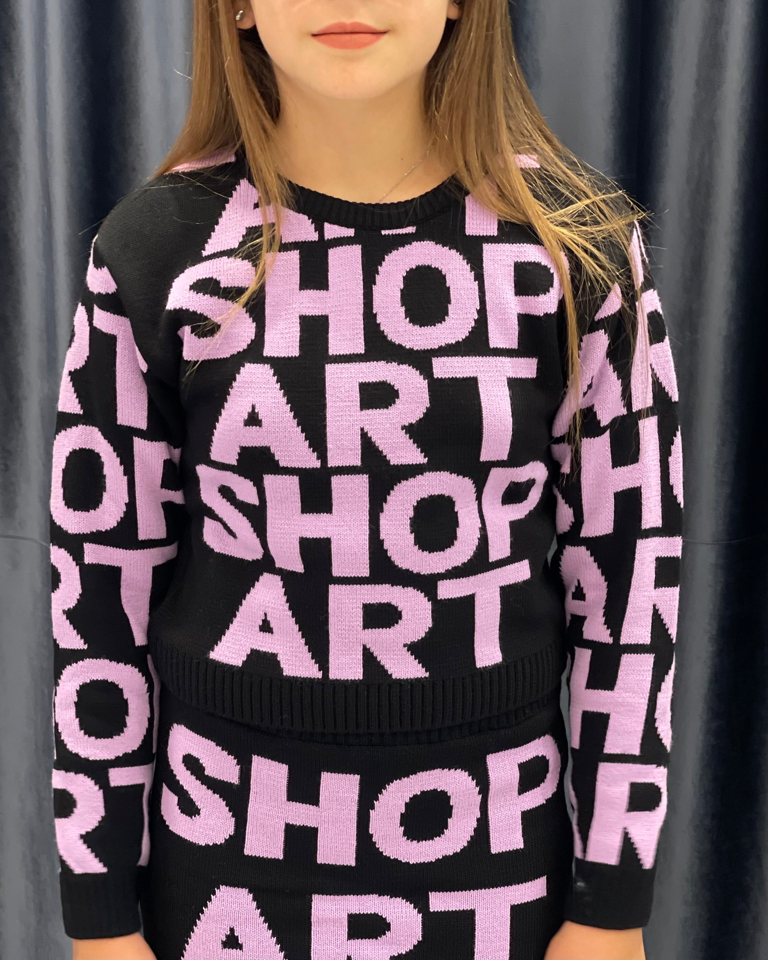 SHOP ART - Maglia bambina nera in lana rasata con logo lilla bambina