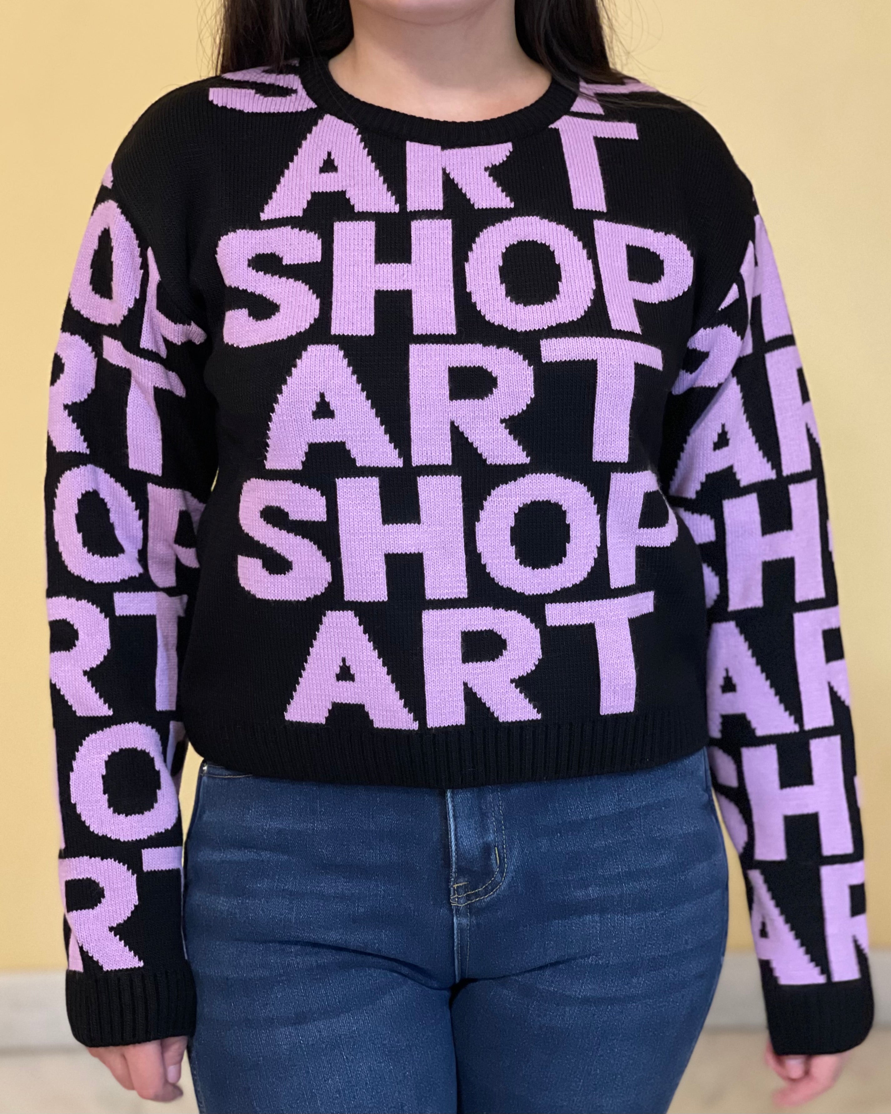 SHOP ART - Maglia bambina nera in lana rasata con logo lilla bambina