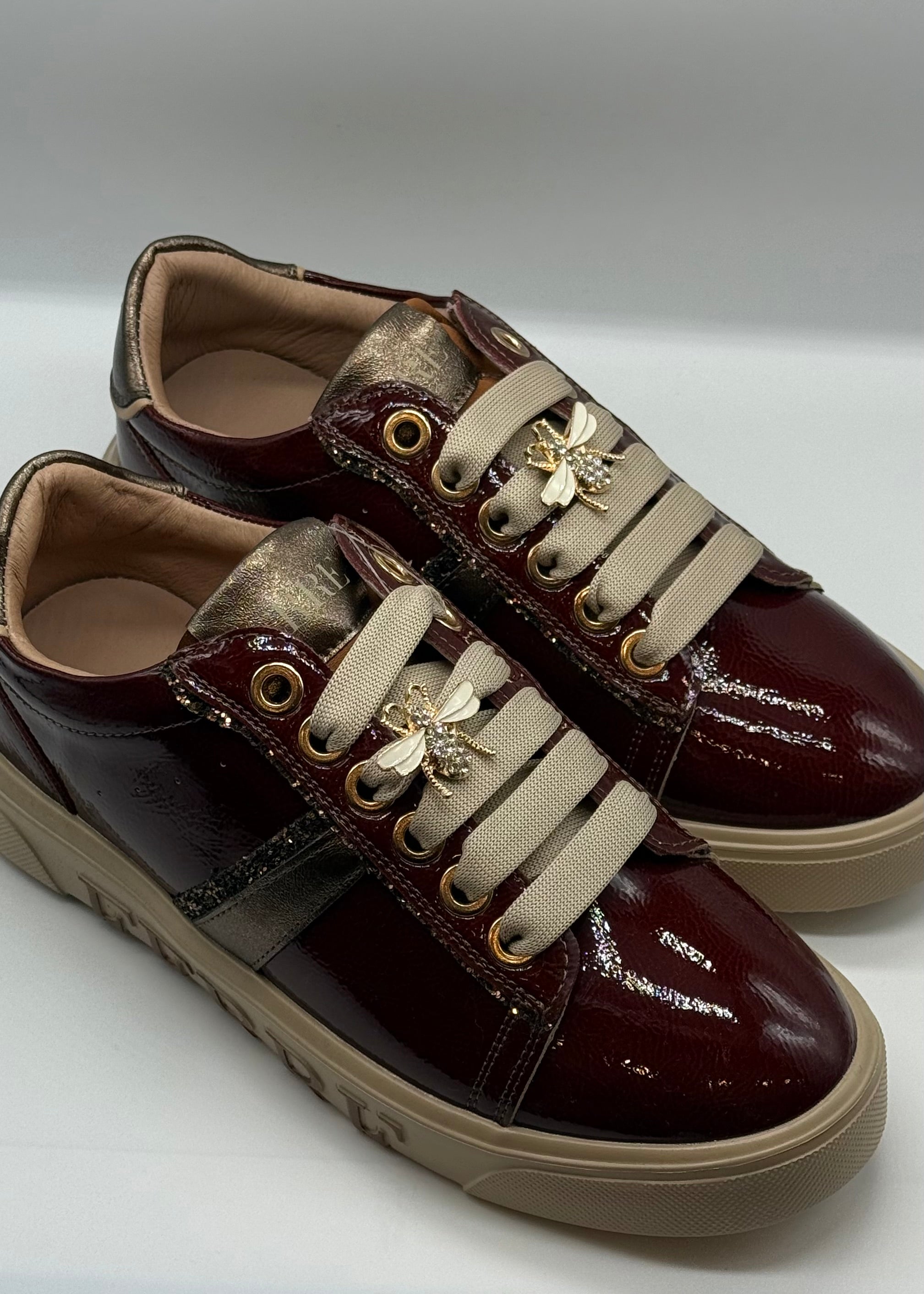 FERRE - Sneakers in vernice con charmes donna