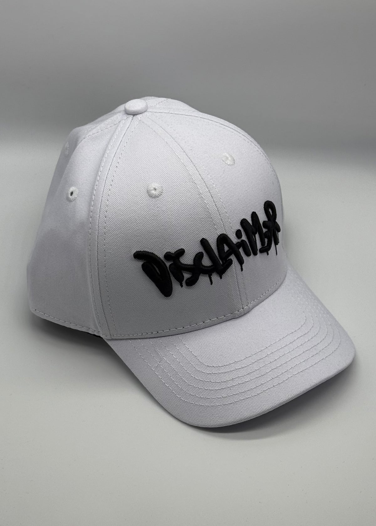 DISCLAIMER - Cappello con visiera bambino/bambina