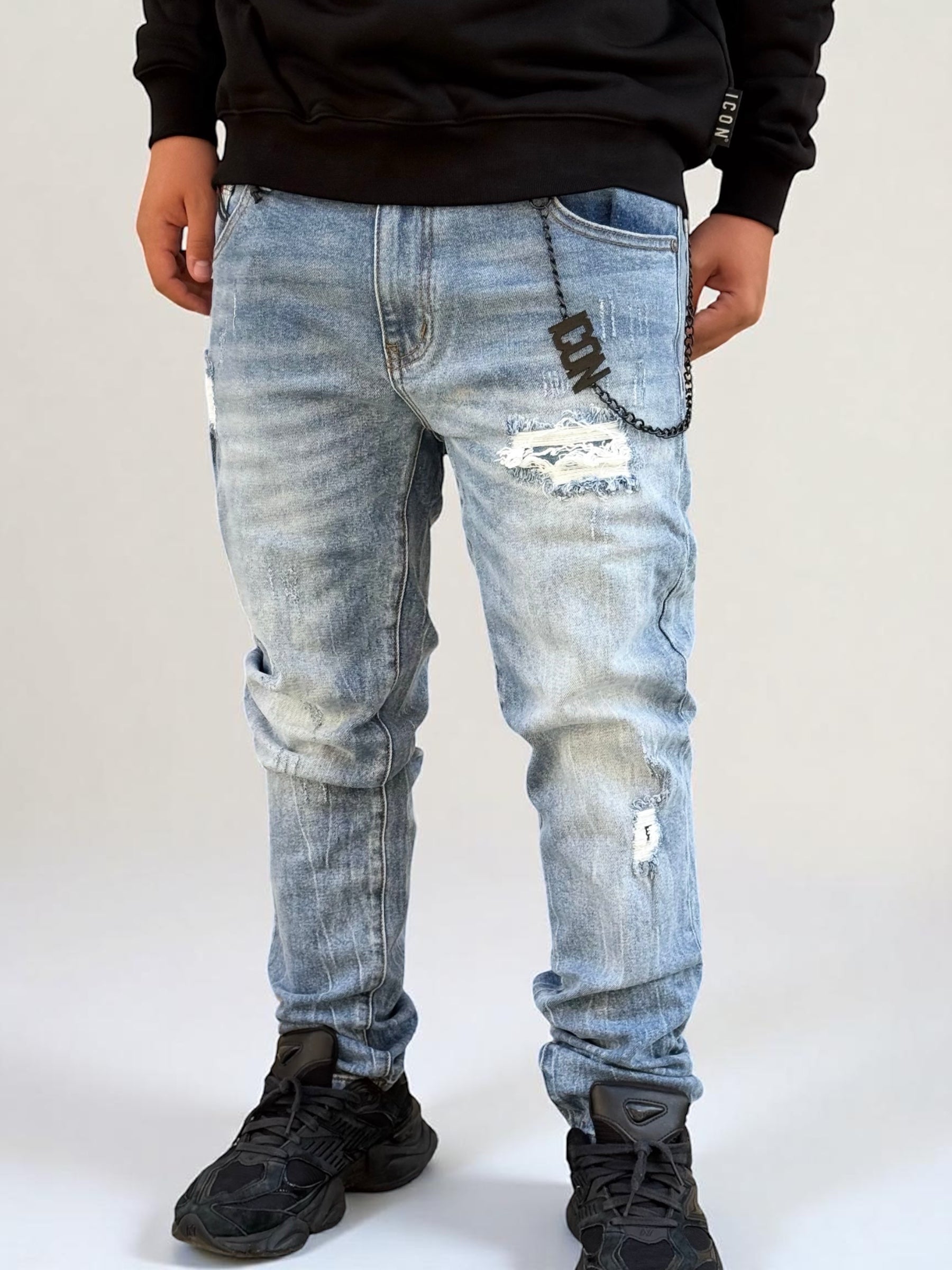 ICON - Jeans slim lavaggio chiaro con logo sul retro uomo