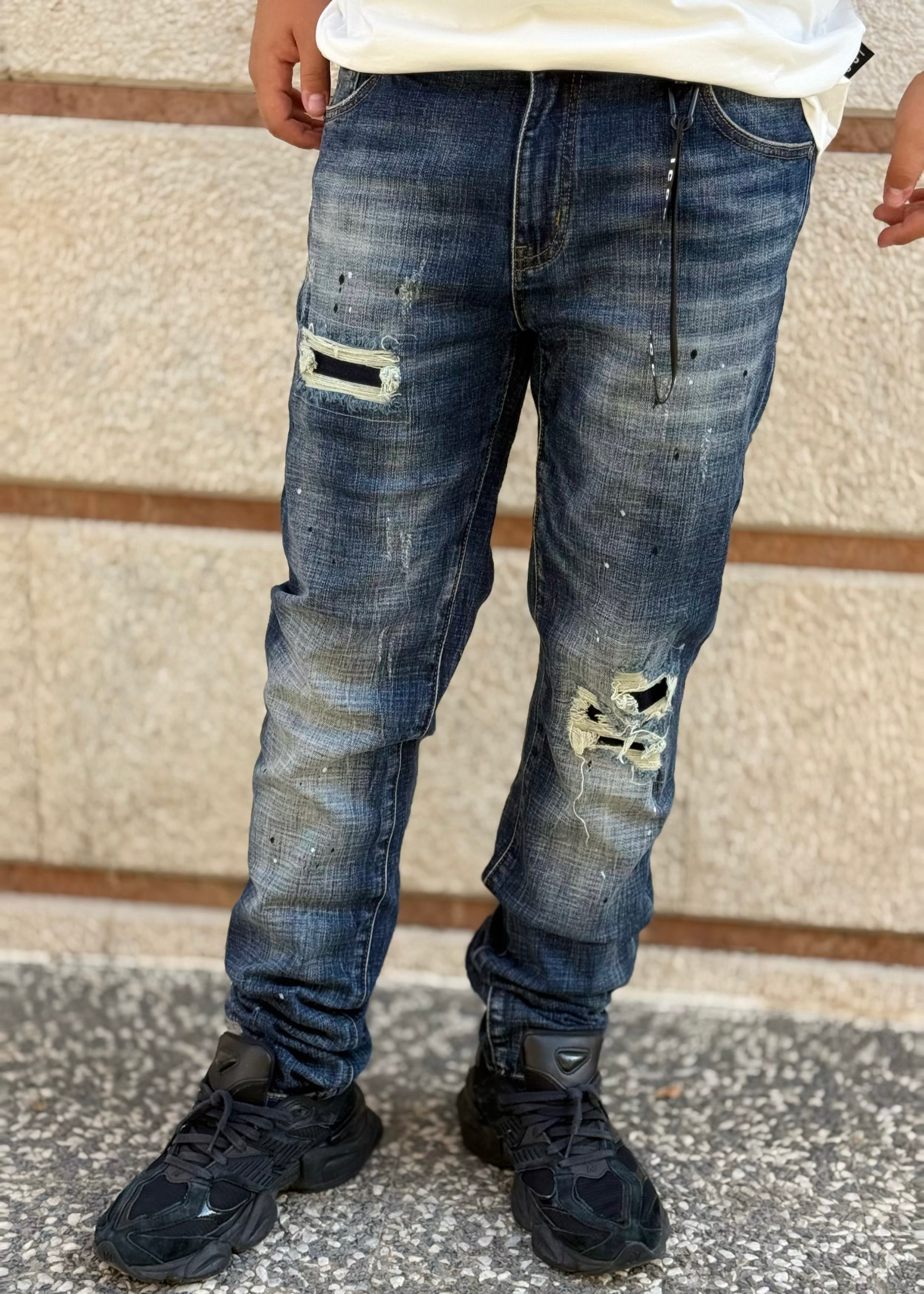 ICON - Jeans lavaggio scuro con logo effetto spray sul retro uomo