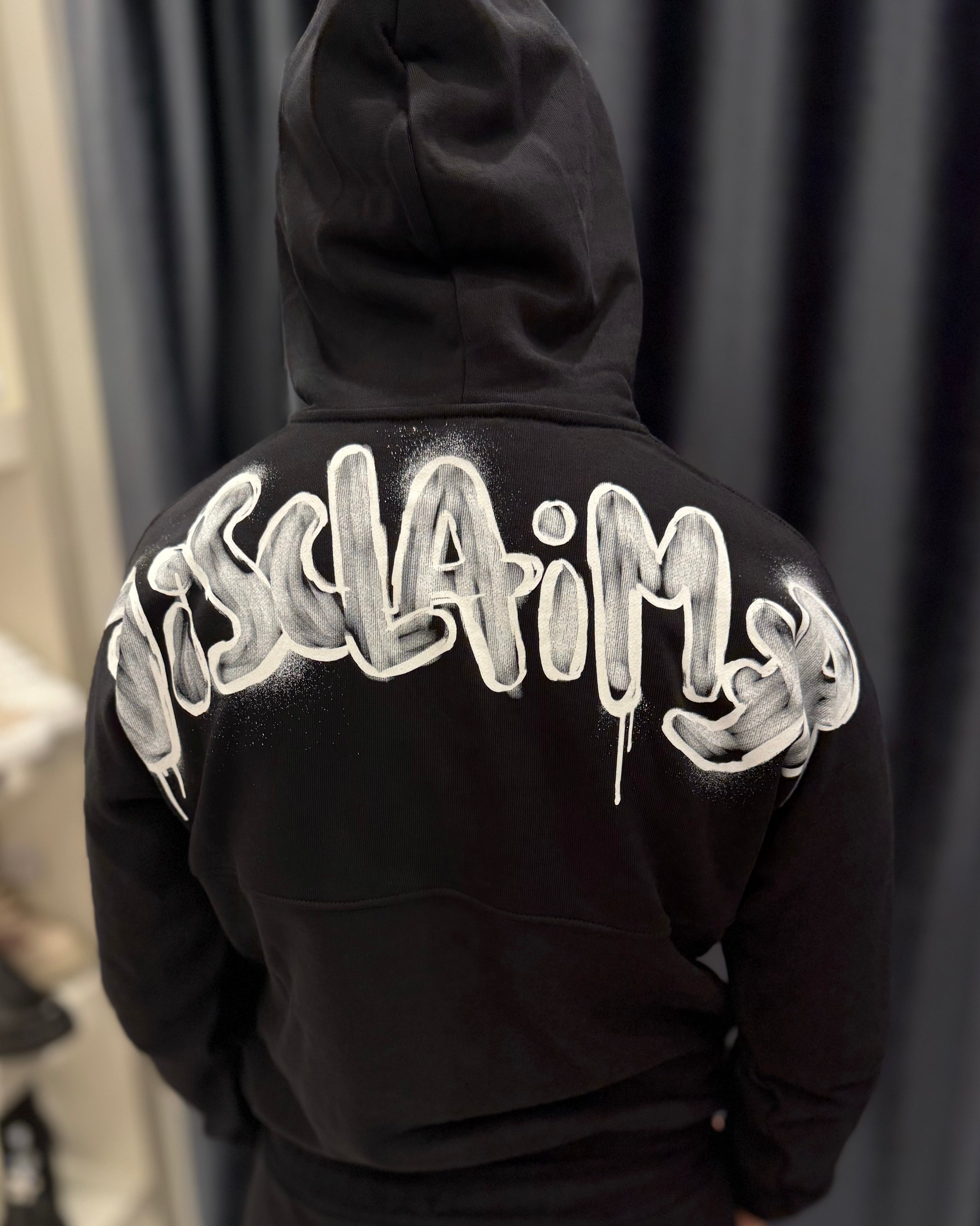 DISCLAIMER - Felpa nera con zip e cappuccio con maxi logo bambino