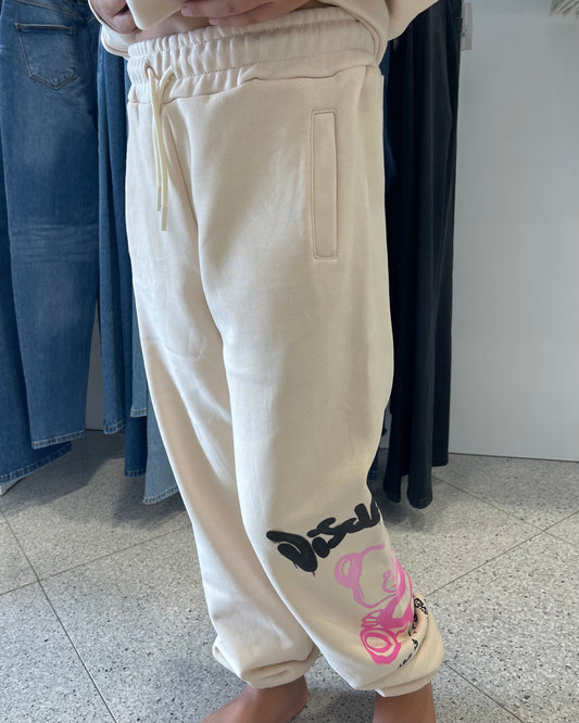 DISCLAIMER - Pantalone tuta crema con stampa rosa bambina