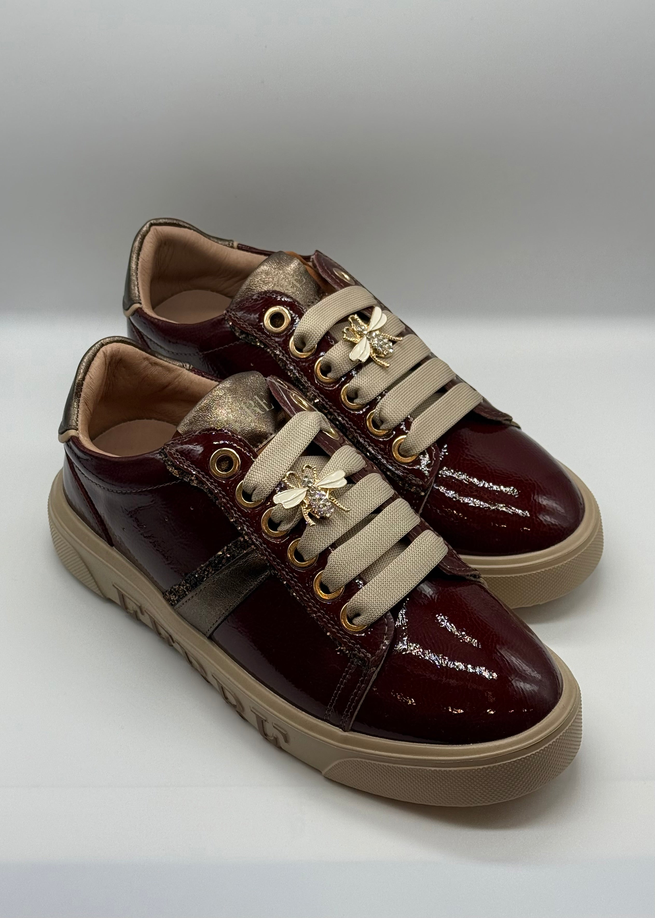 FERRE - Sneakers in vernice con charmes donna