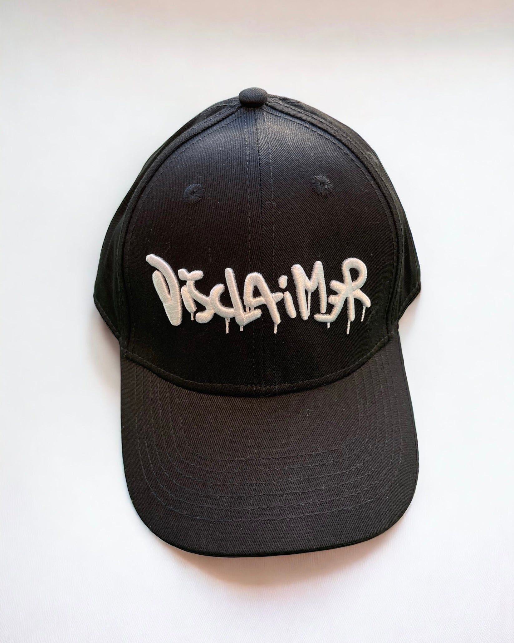 DISCLAIMER - Cappello con logo uomo/donna