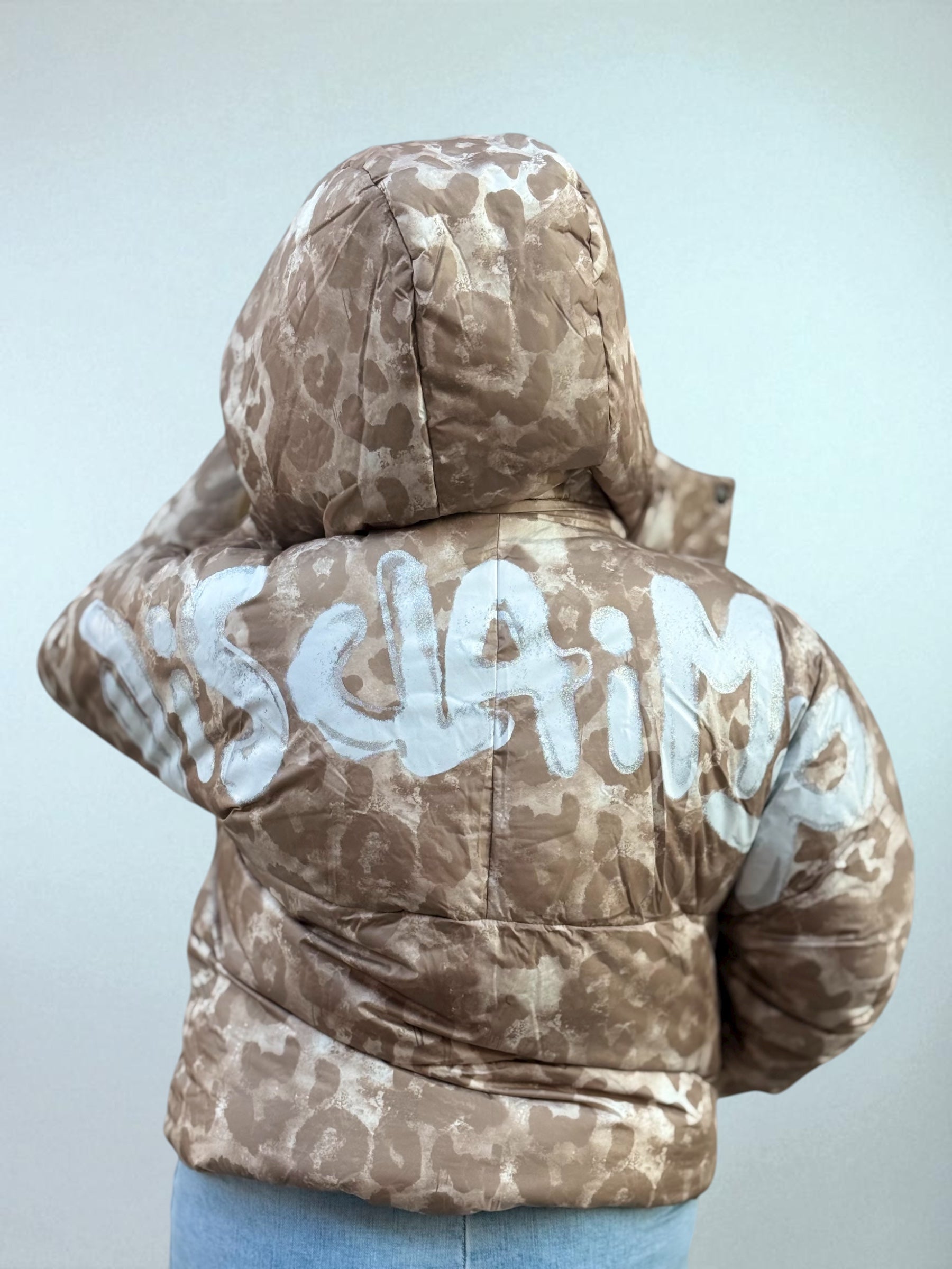 DISCLAIMER - Giubbotto maculato con cappuccio donna